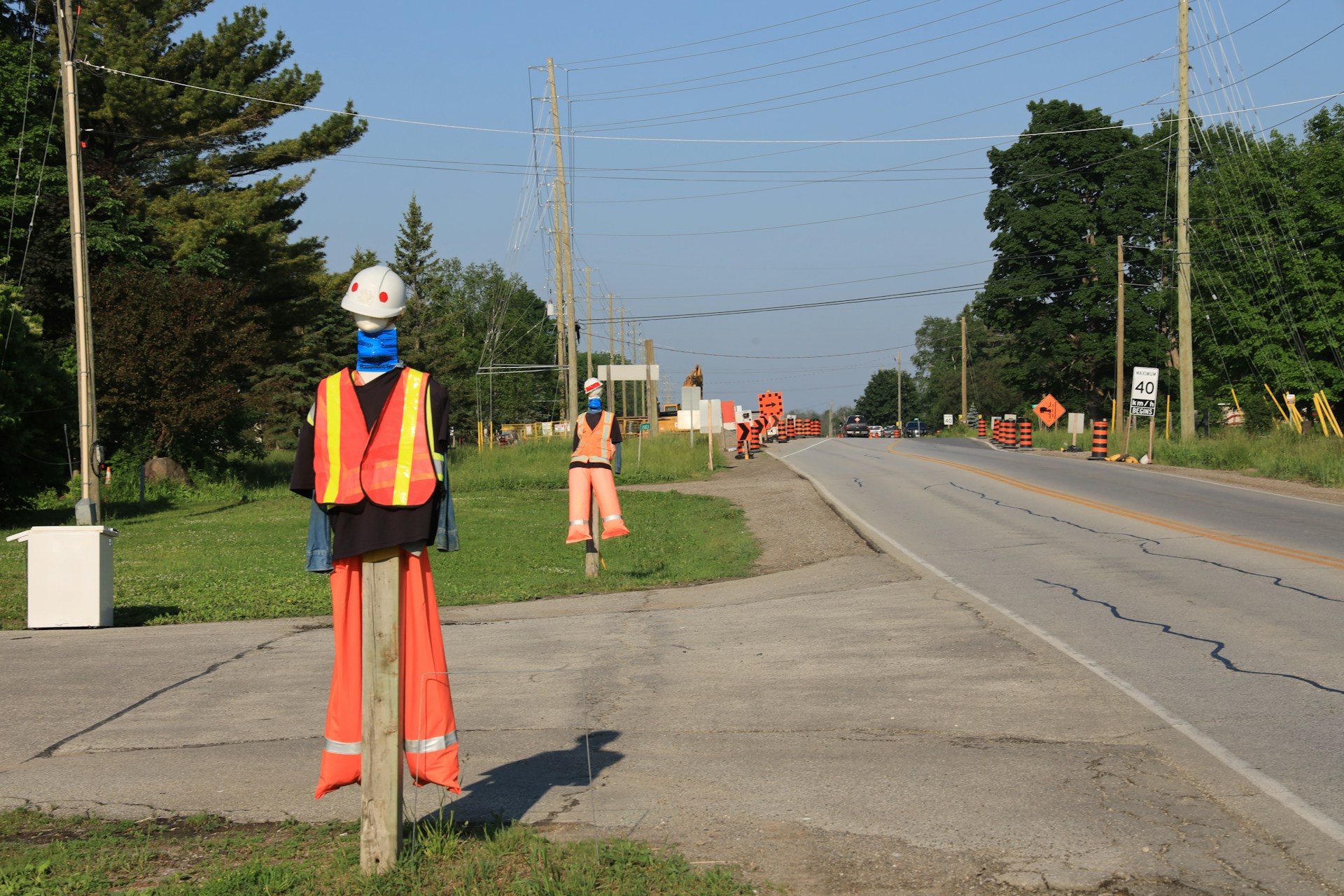 people standing on gray asphalt road during daytime