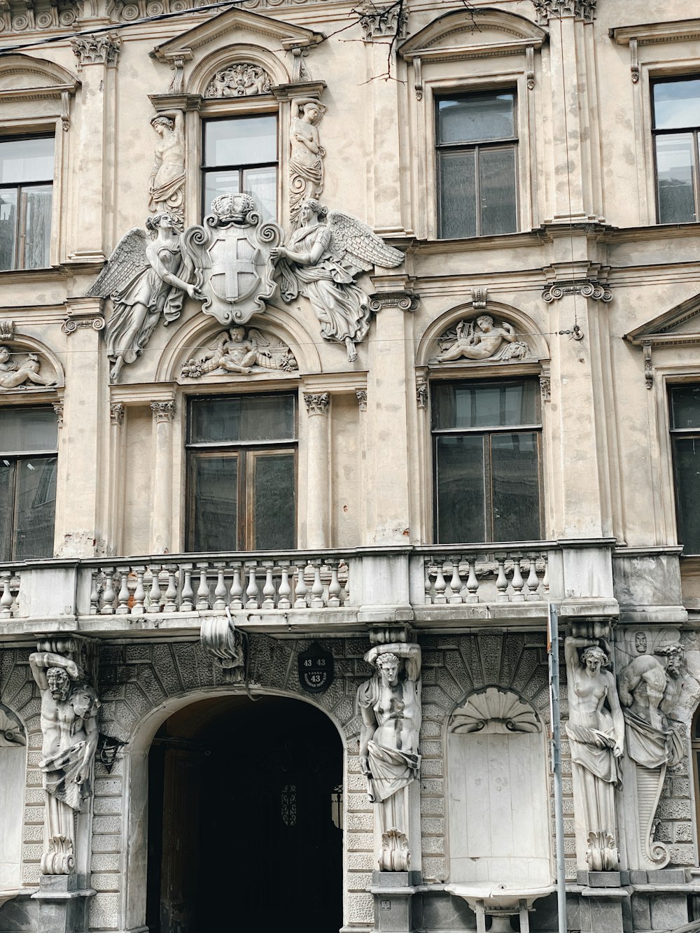 a large building with a clock on the front of it