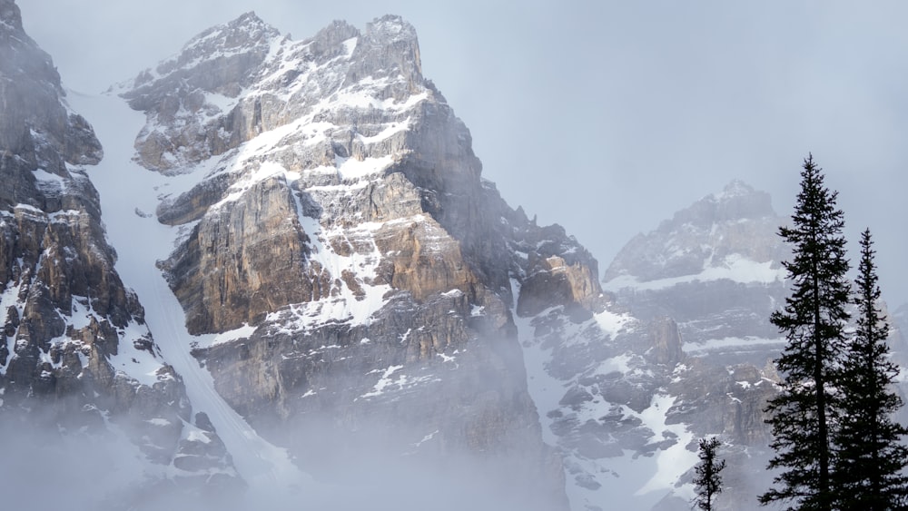 snow covered mountain during daytime