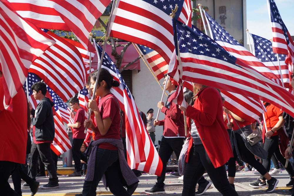 people holding us a flags