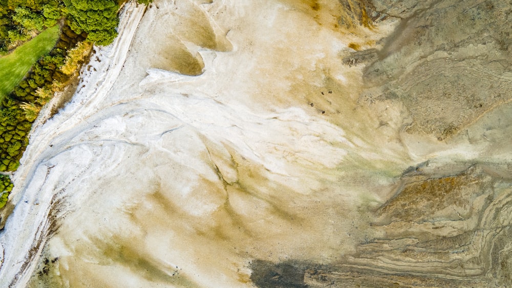 a bird's eye view of a sandy beach