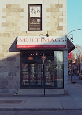 a building with a sign that reads multi mags