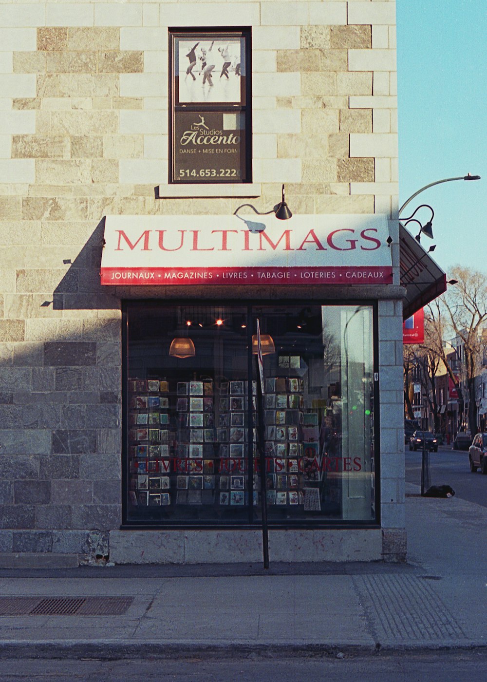 a building with a sign that reads multi mags