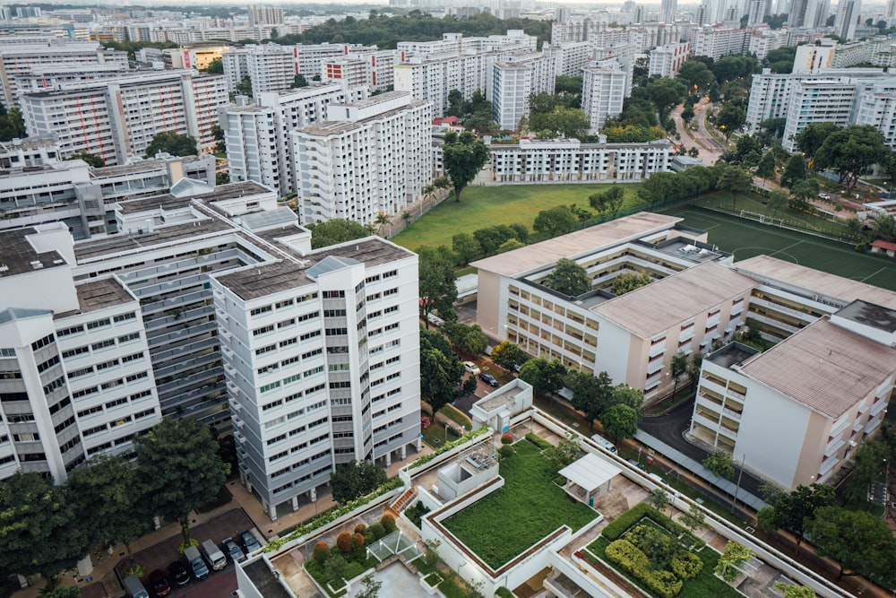 an aerial view of a city with lots of tall buildings