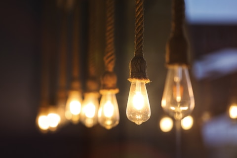 selective focus photography of pendant lamps