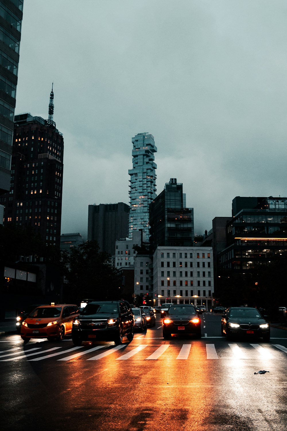 a car driving on a city street filled with lots of traffic