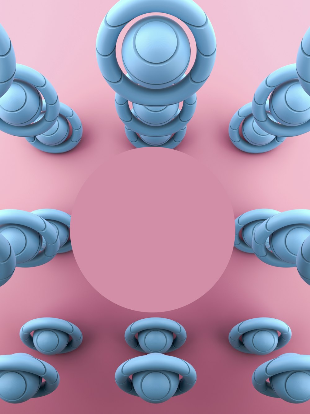 a group of blue objects sitting on top of a pink surface