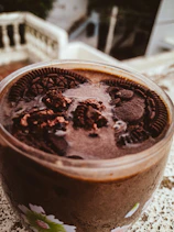 chocolate ice cream on white ceramic bowl