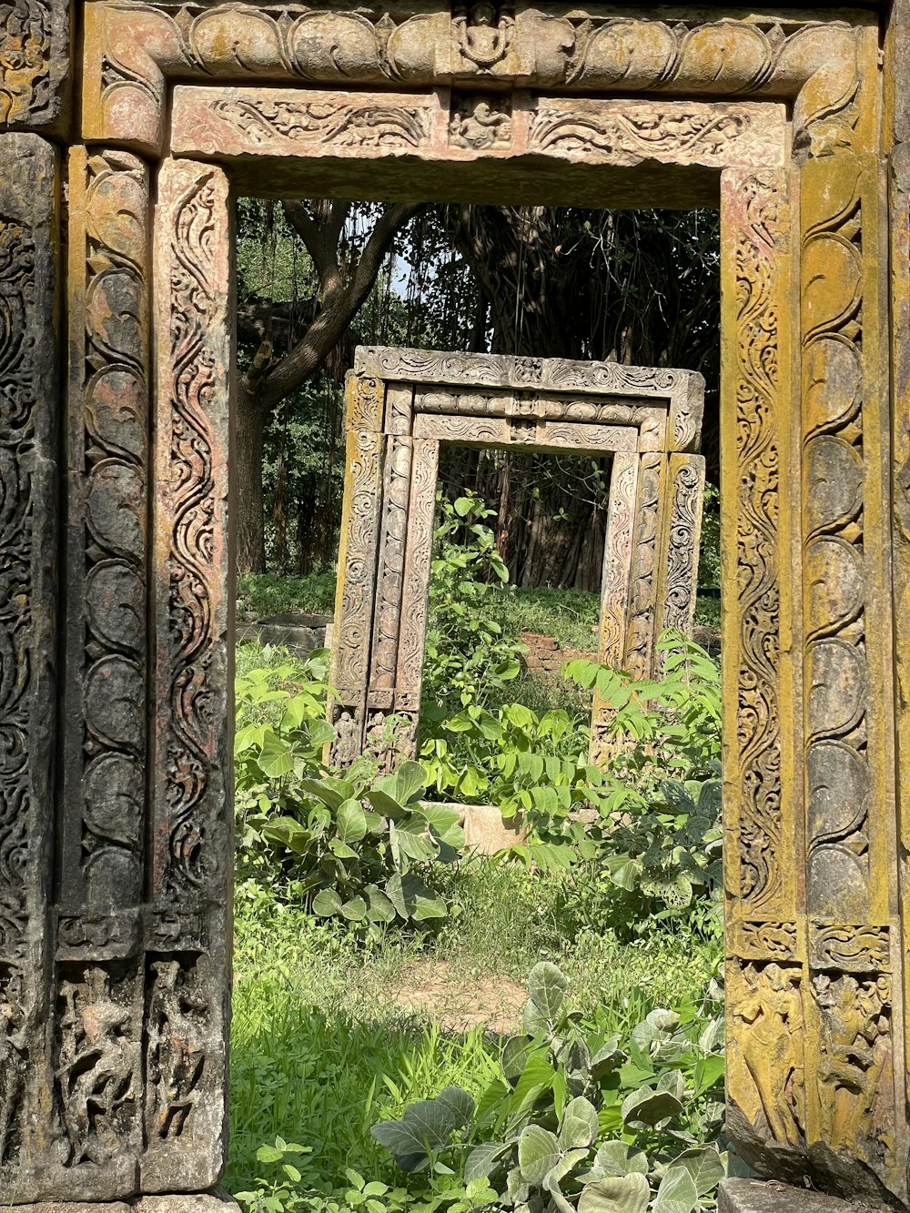 brown wooden frame on green grass