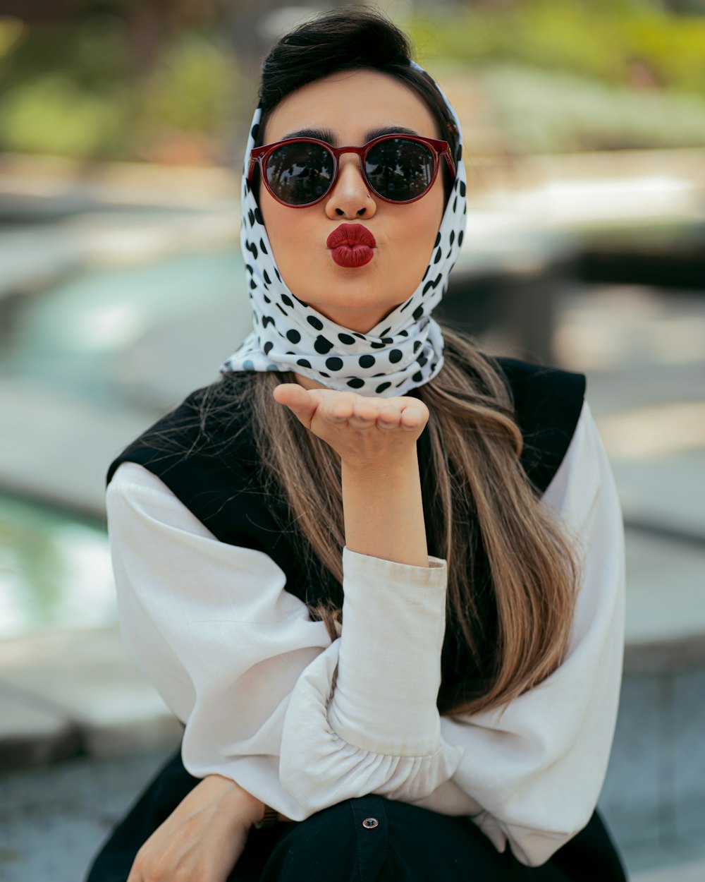 a woman with a scarf around her head