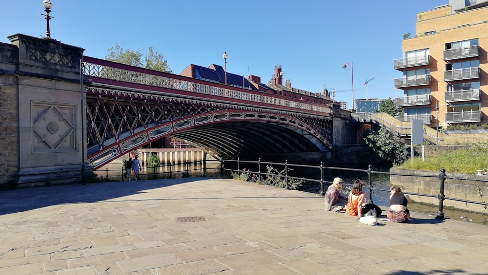 people walking on bridge during daytime