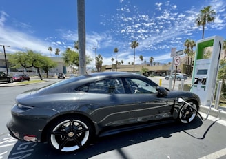 black sedan on road during daytime