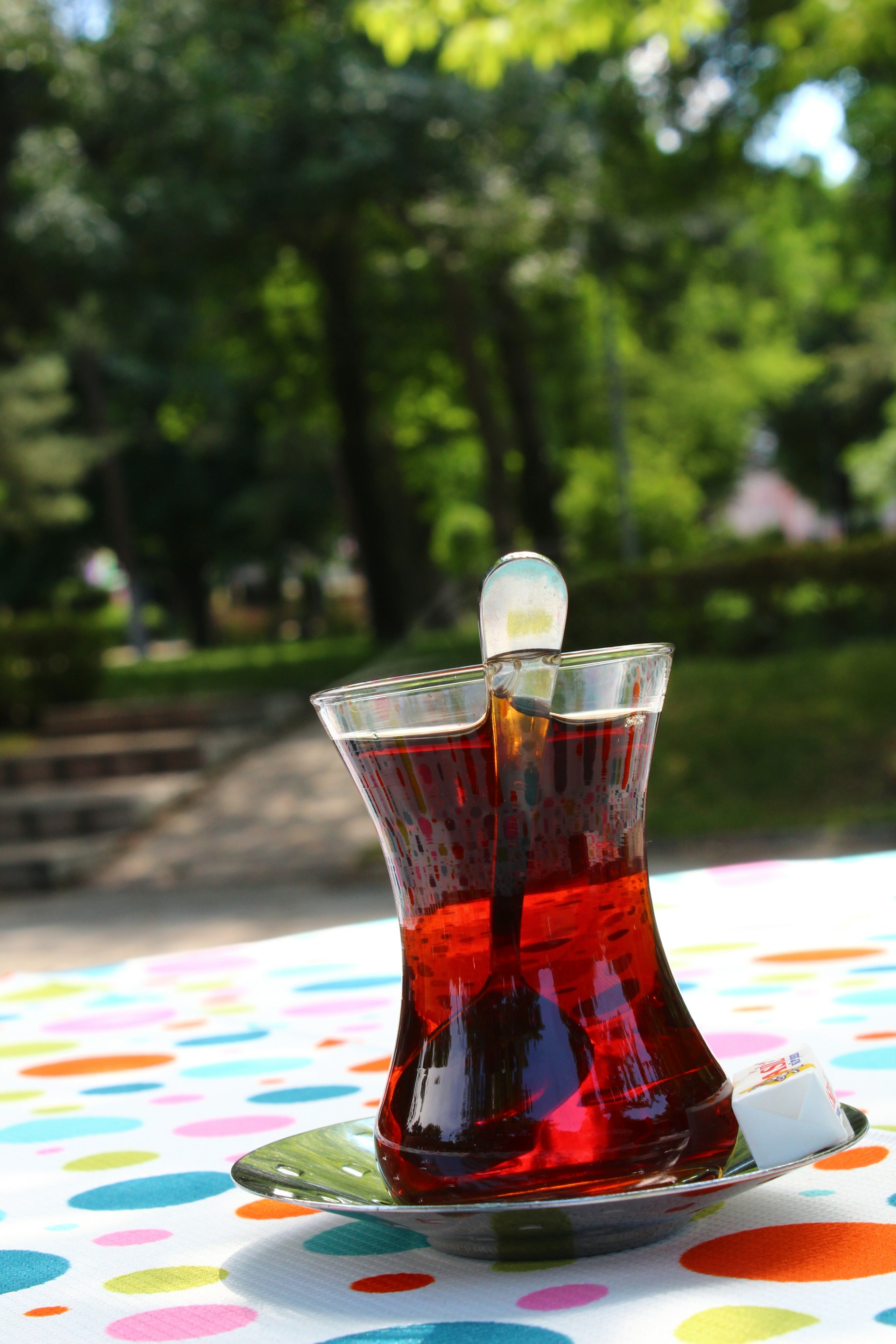 clear drinking glass with red liquid