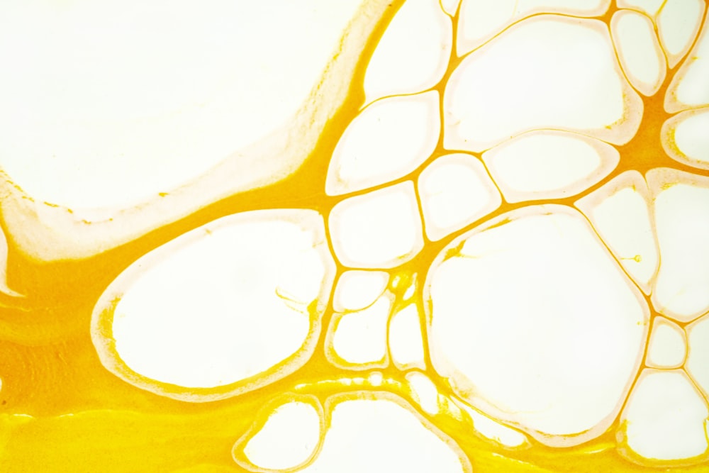 a close up view of a yellow liquid