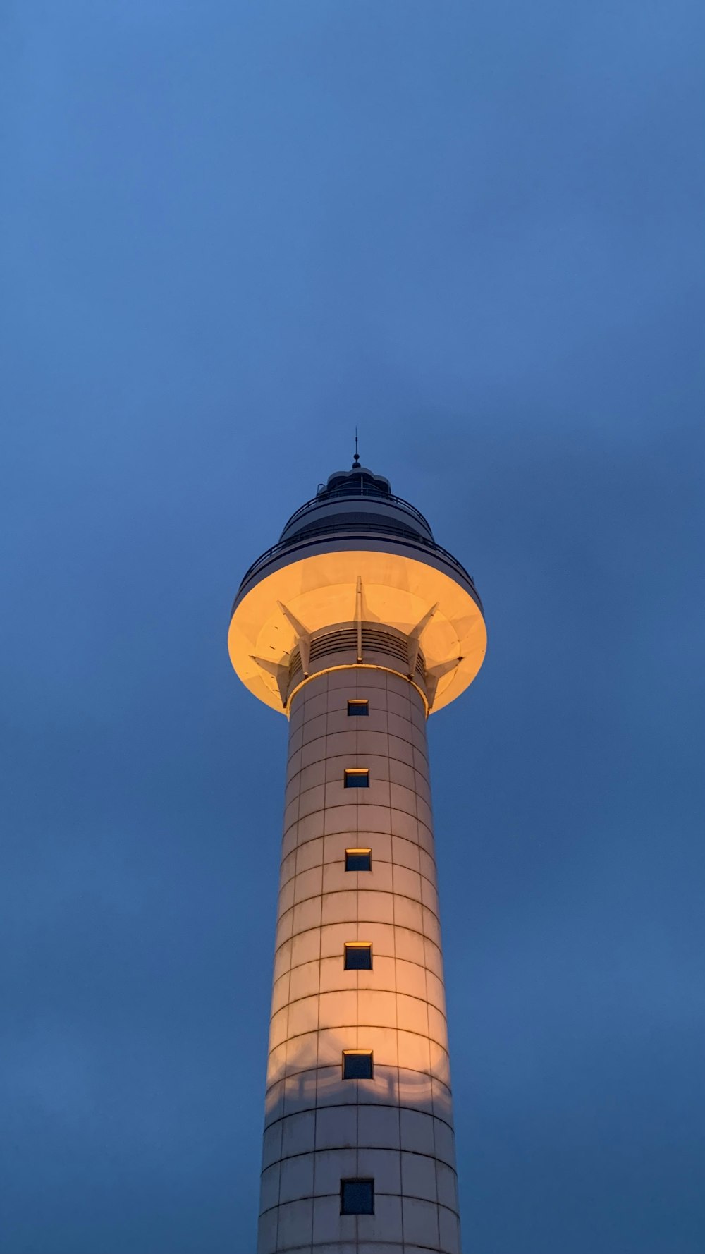 white and black tower under blue sky during daytime