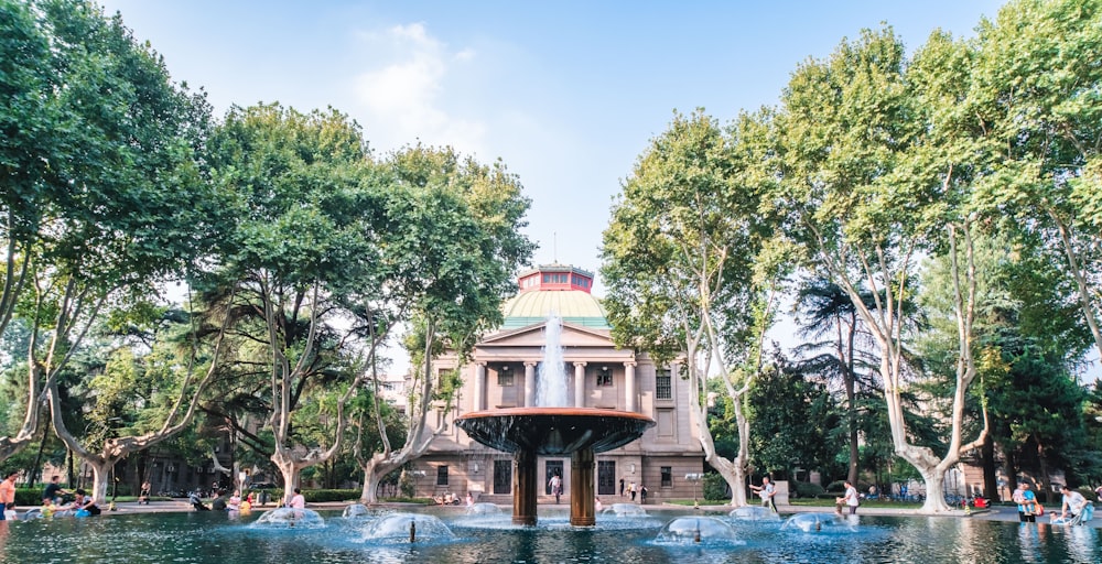 a building with a fountain in front of it