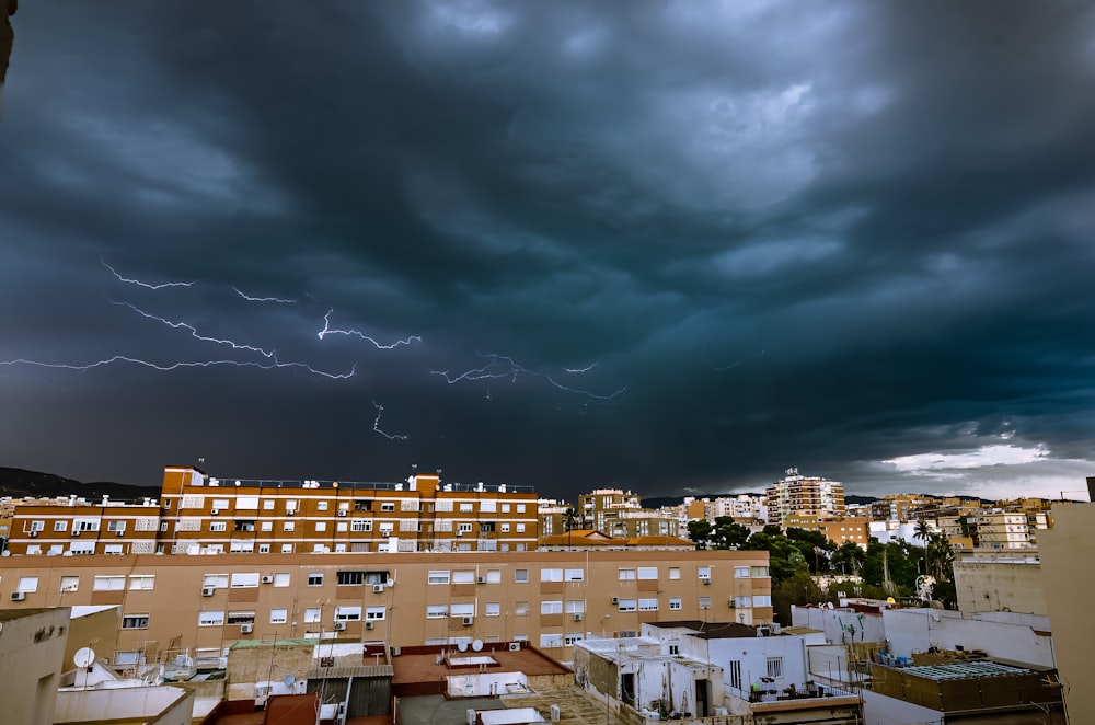 a storm is coming in over a city