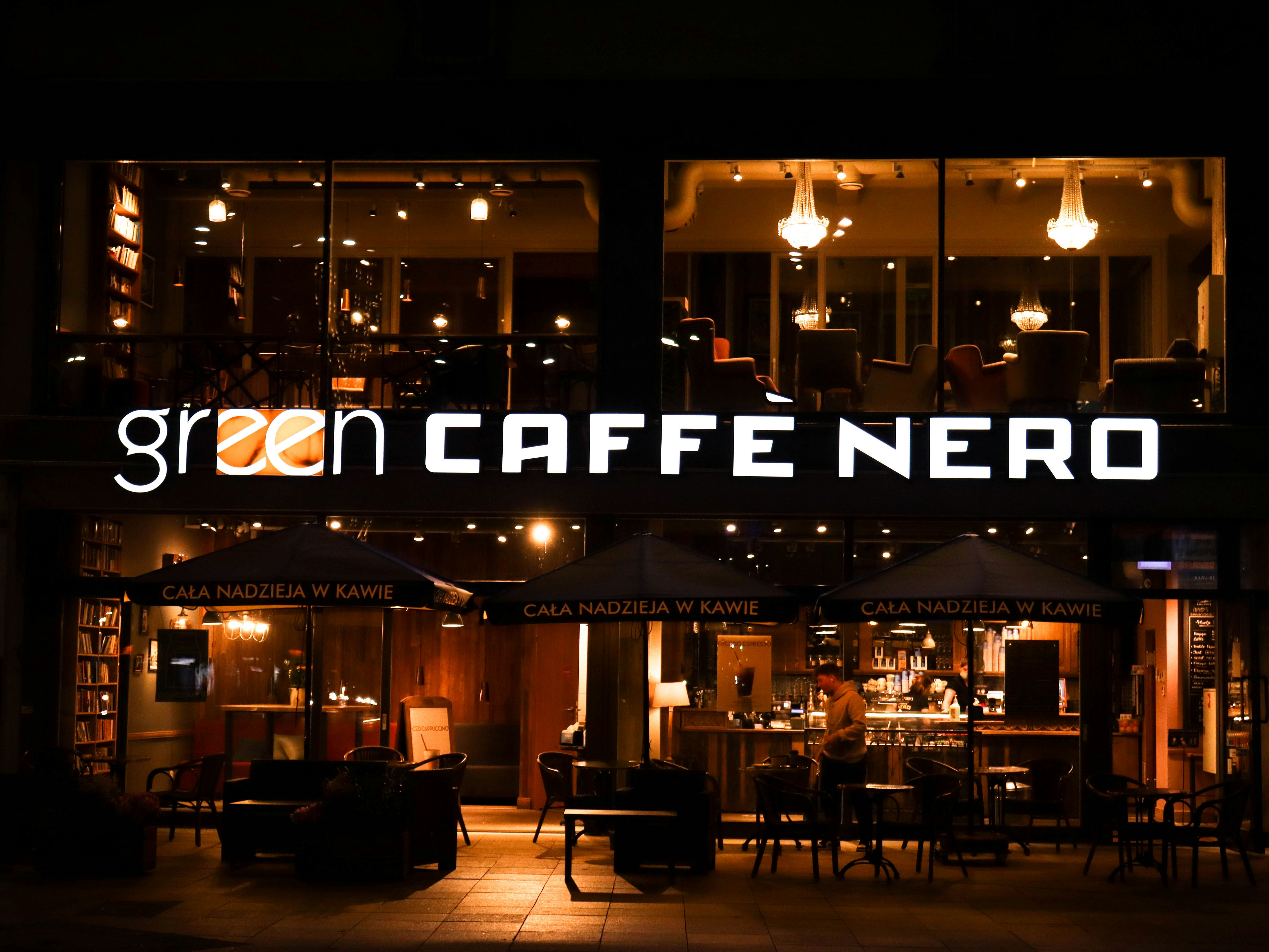 people sitting on chair near table during night time, 