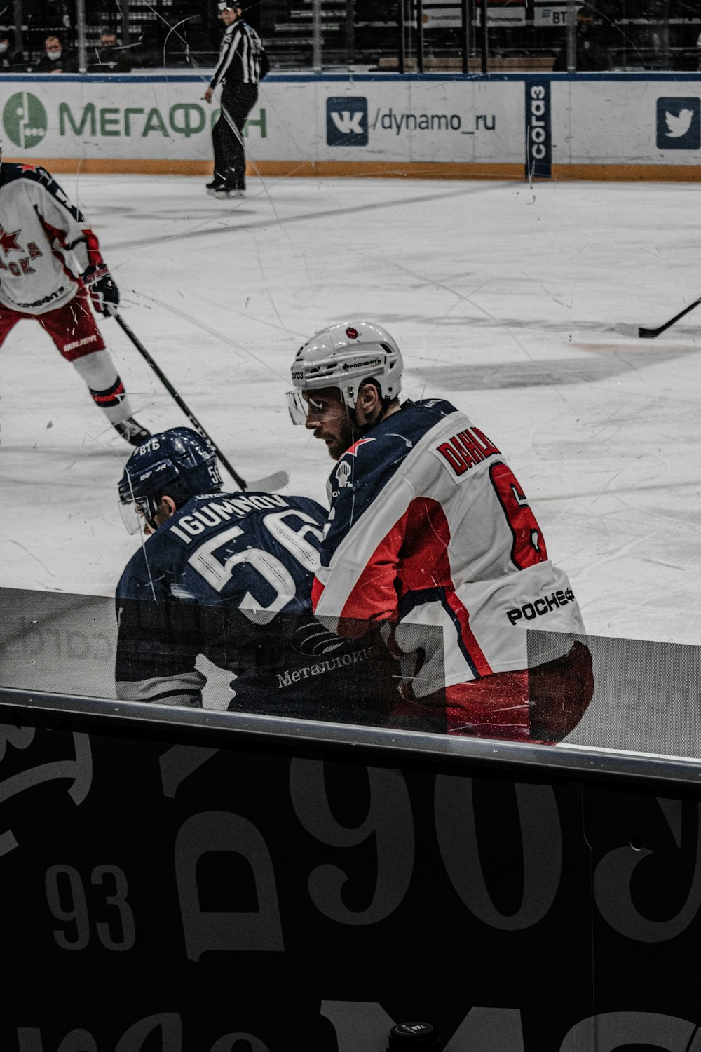 A hockey player is standing on the ice photo – Hockey Image on Unsplash