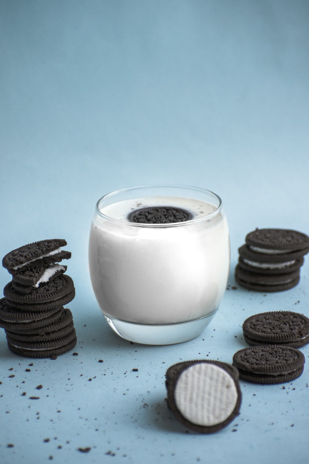clear glass with milk and cookies