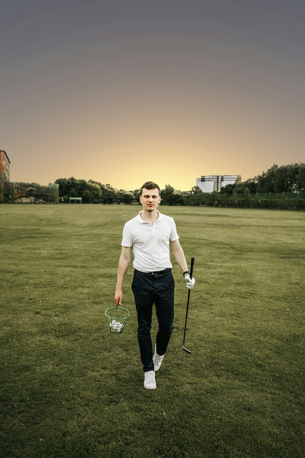 a man throwing a frisbee in a field