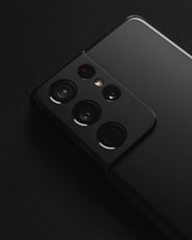 black remote control on black textile