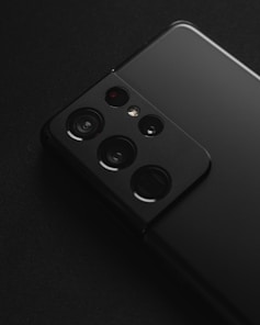 black remote control on black textile