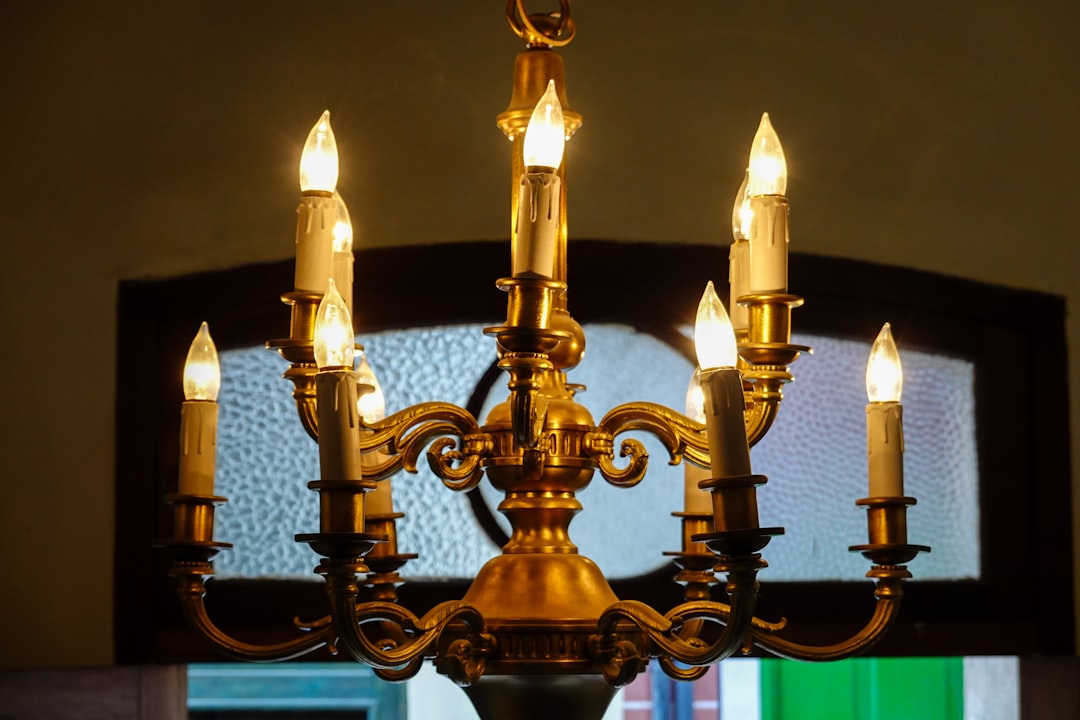 gold candle holder with candles