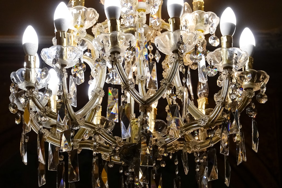 brass and white uplight chandelier