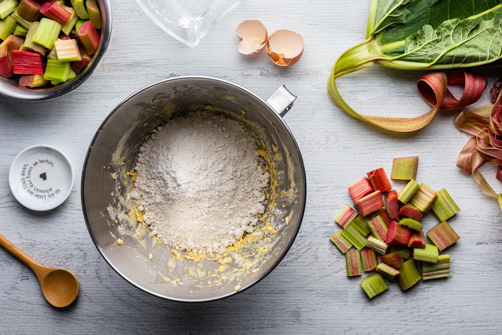 stainless steel round plate with rice and vegetables