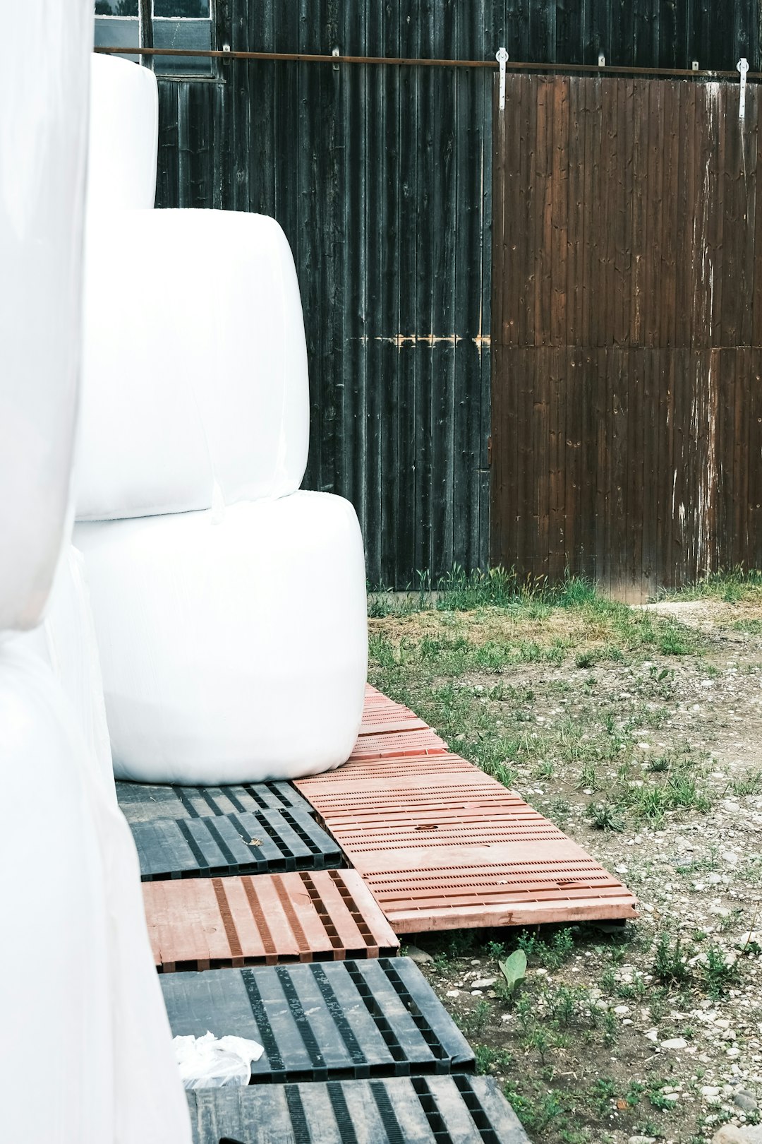 white leather armchair on brown wooden floor