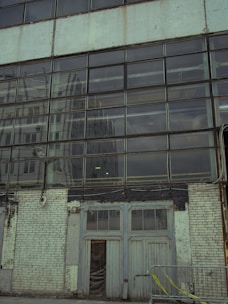 A commercial building featuring sturdy, impact-resistant doors and windows.