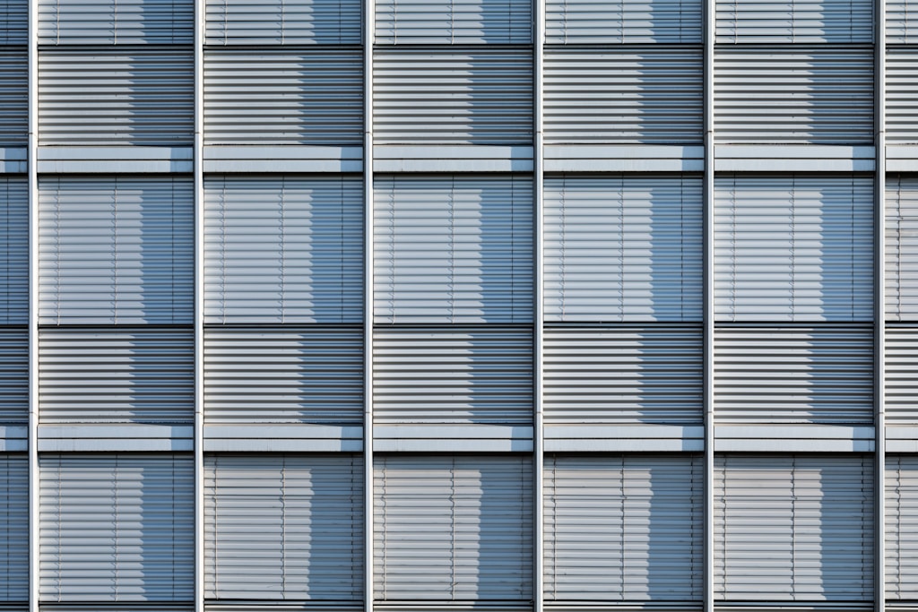 white and blue window blinds