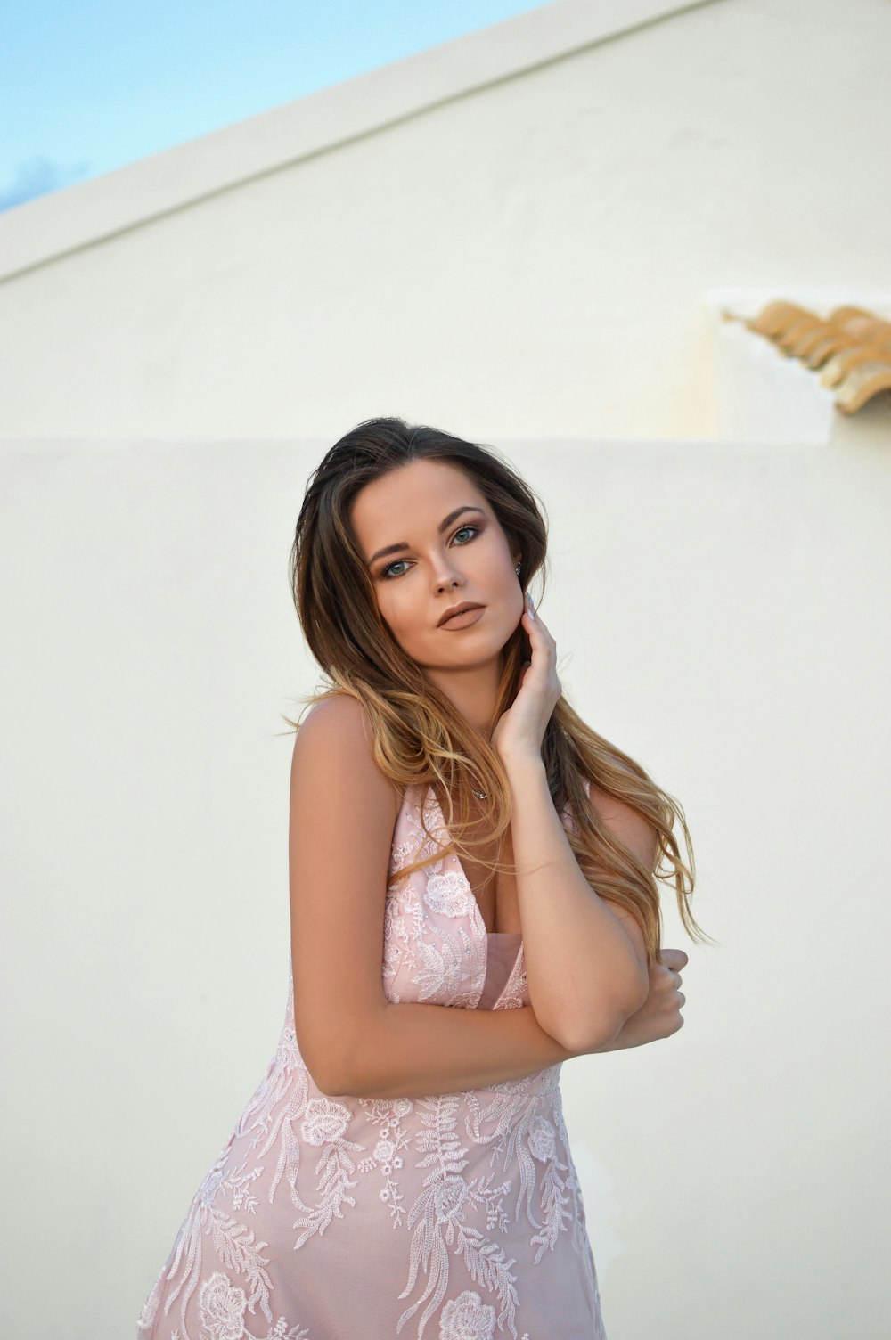 woman in white lace tank top