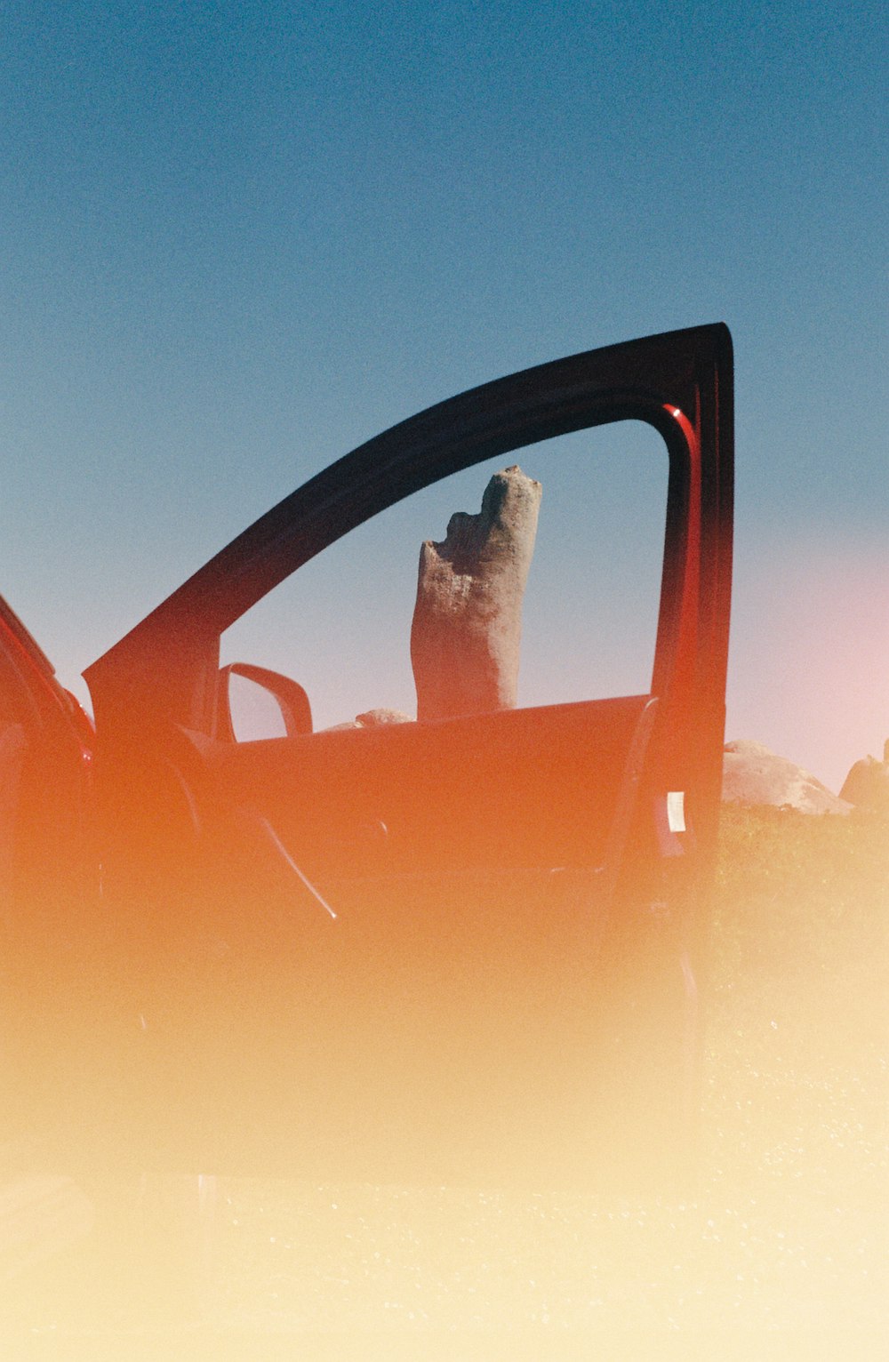 black car steering wheel during daytime