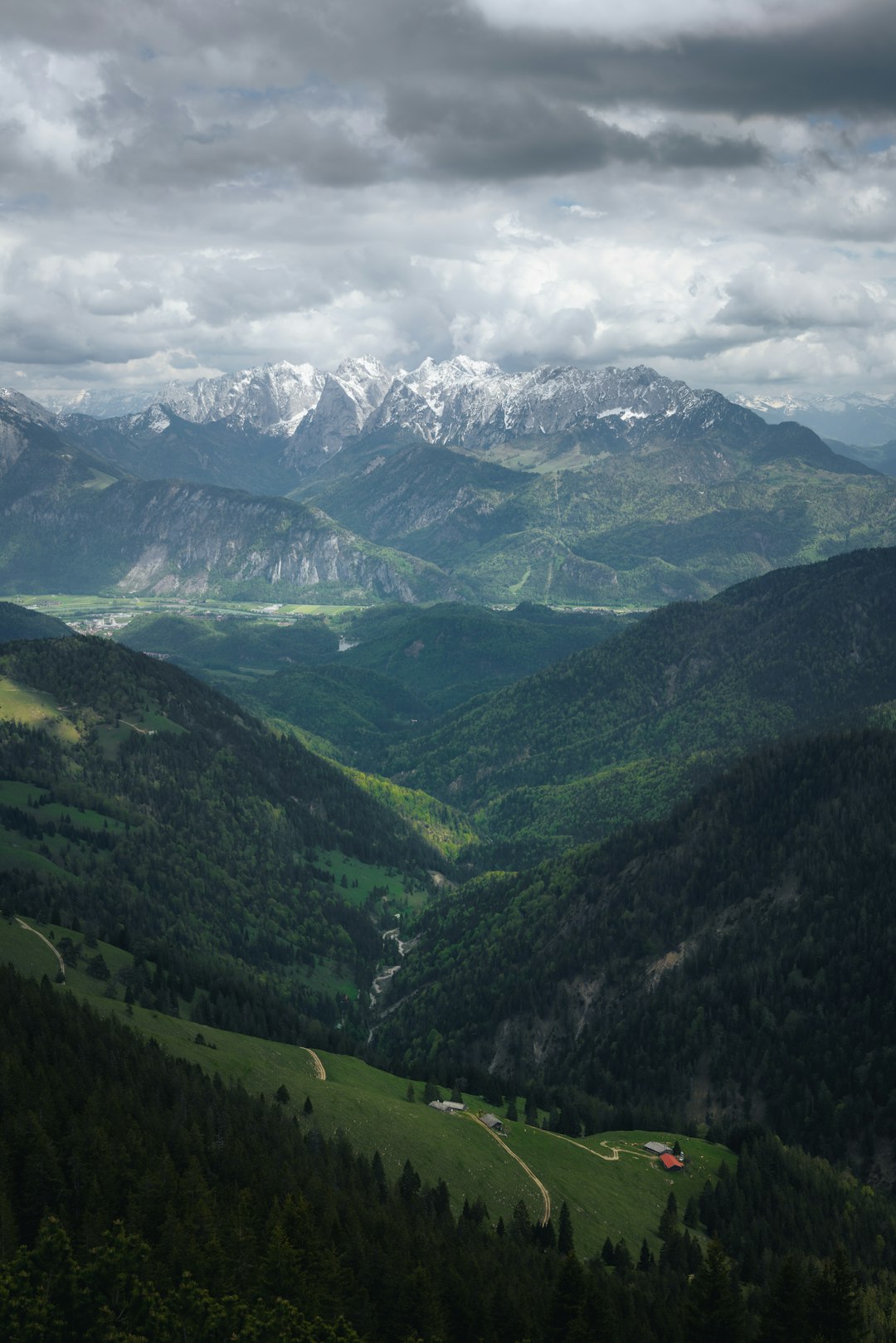 green mountains under white clouds during daytime