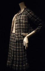 woman in black and white plaid dress