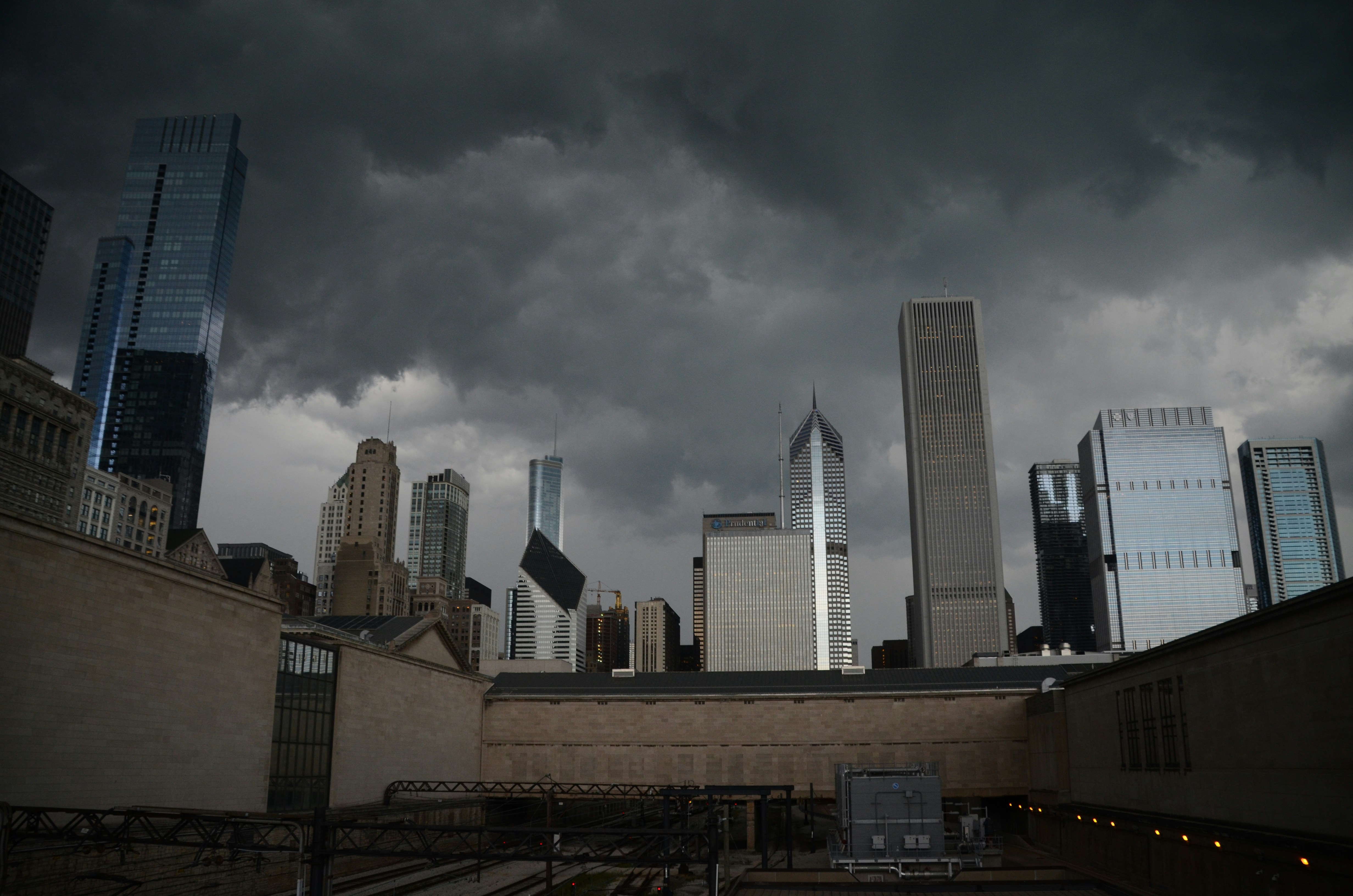 city buildings under gray clouds during daytime