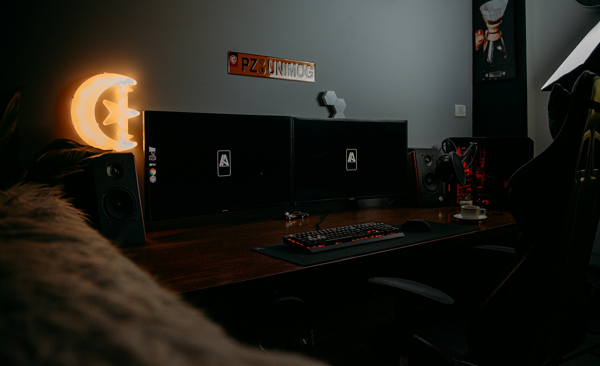 A behind-the-scenes photo of the Moonrise Gaming team collaborating in a creative studio illuminated by soft moonlight-inspired lighting.