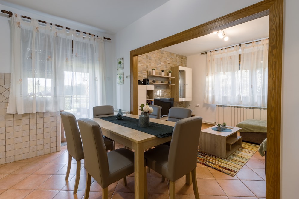 brown wooden table with chairs