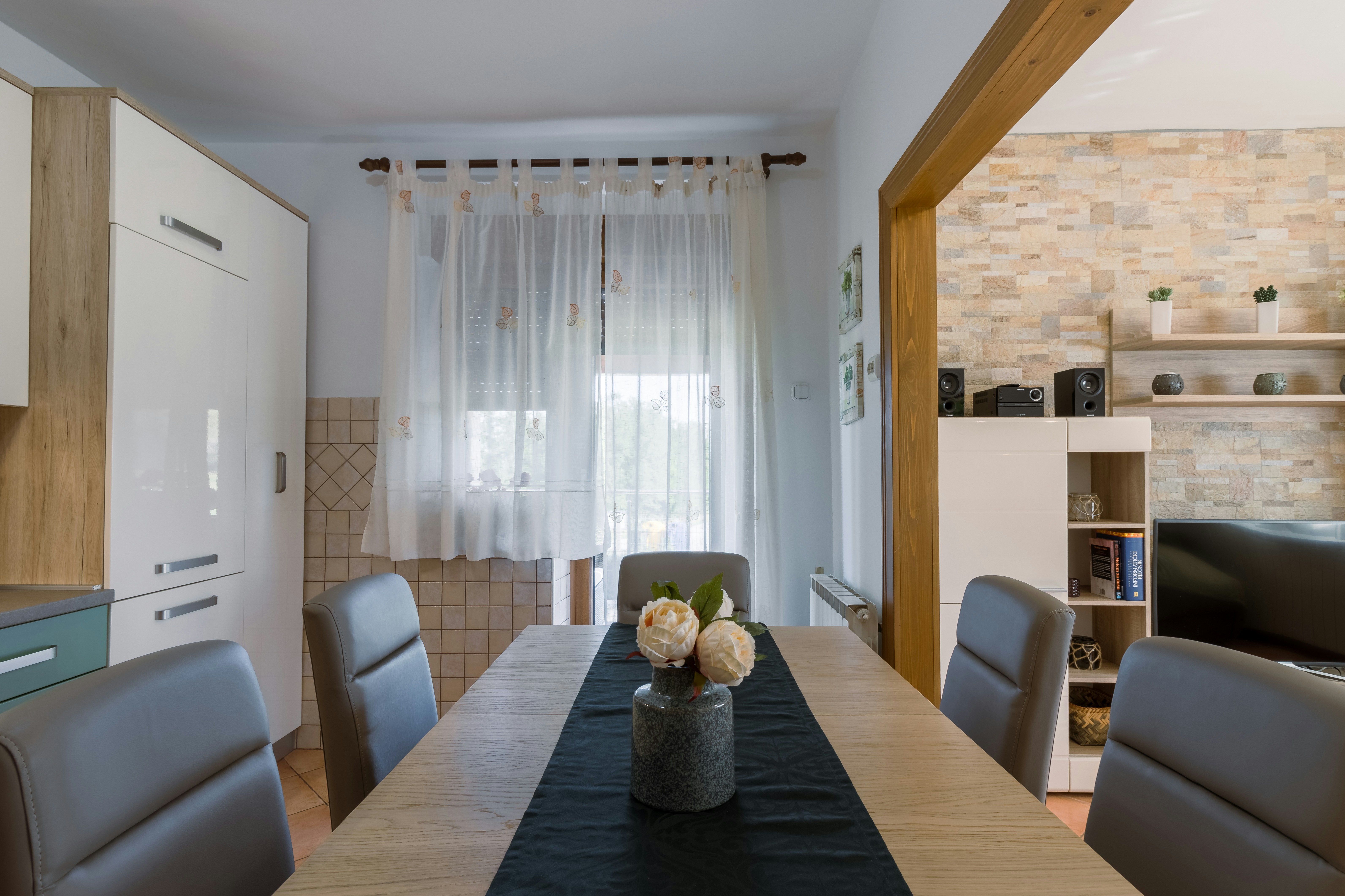 black wooden table with chairs