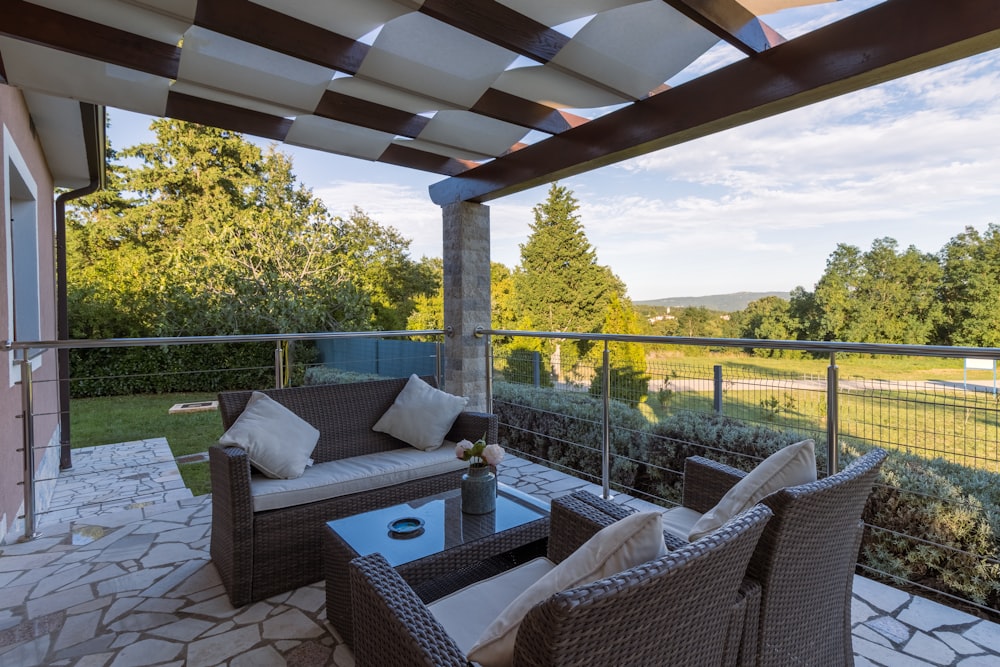 brown wicker chairs and table