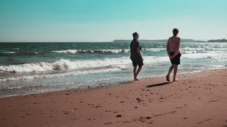 couple walking on beach after couples therapy in Hawaii