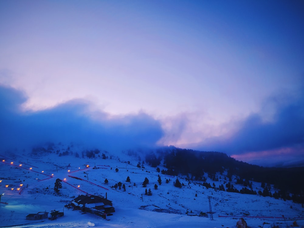 snow covered mountain during daytime