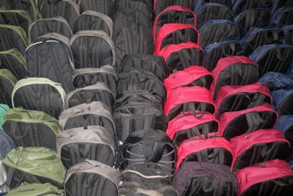 A collection of different styles of outdoor backpacks.