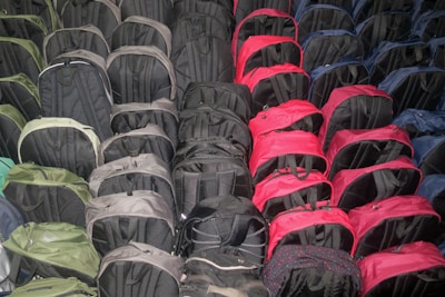 A collection of backpacks in different styles and colors.