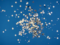 Illustrated stars and playful icons from our brand scattered across a cheerful background.