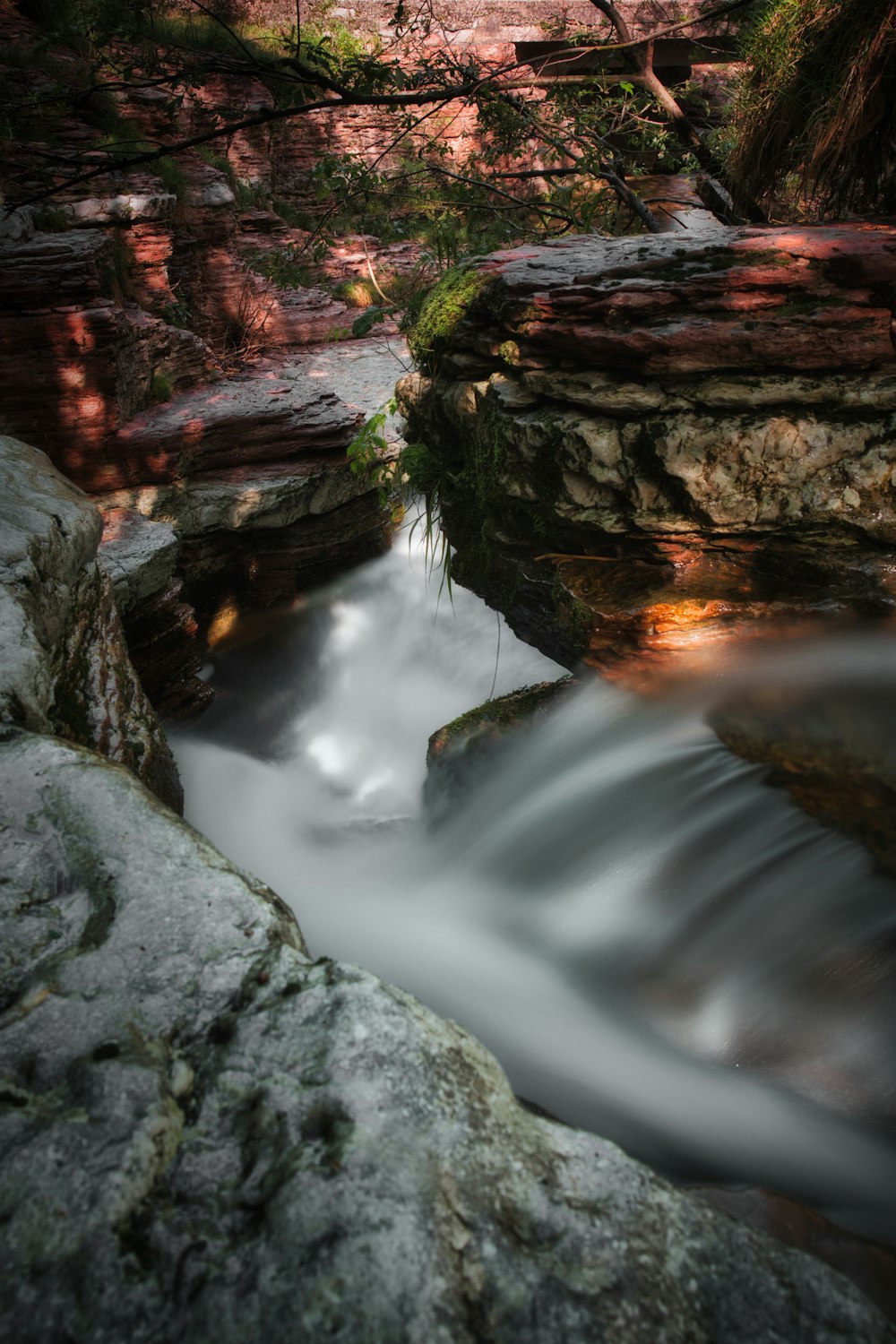 water falls in the middle of rocks