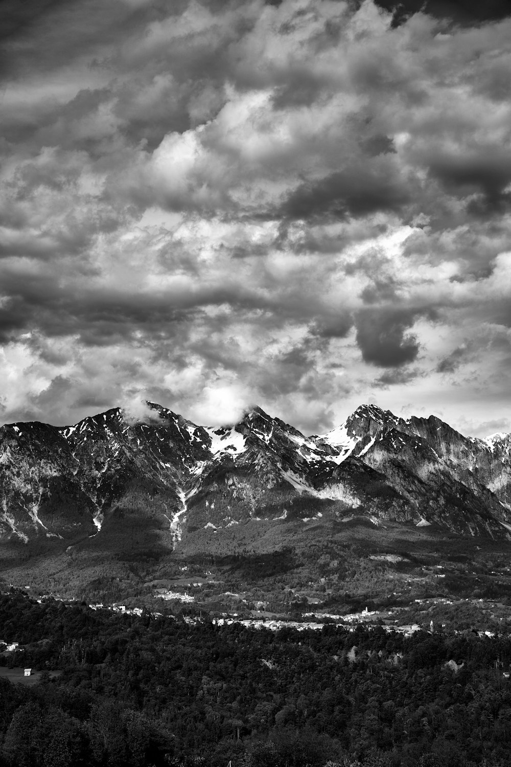 grayscale photo of snow covered mountain