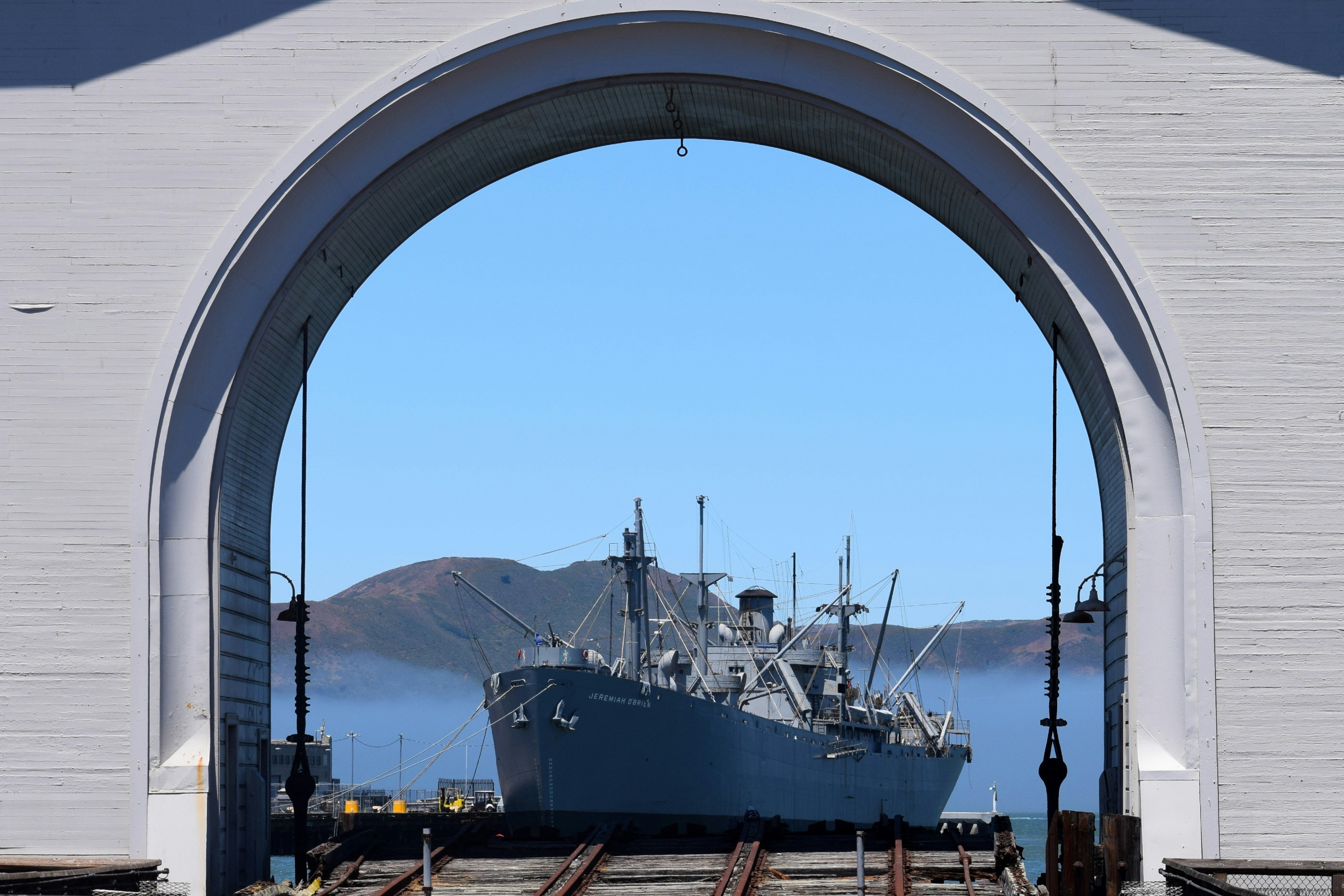 white and black ship on sea during daytime
